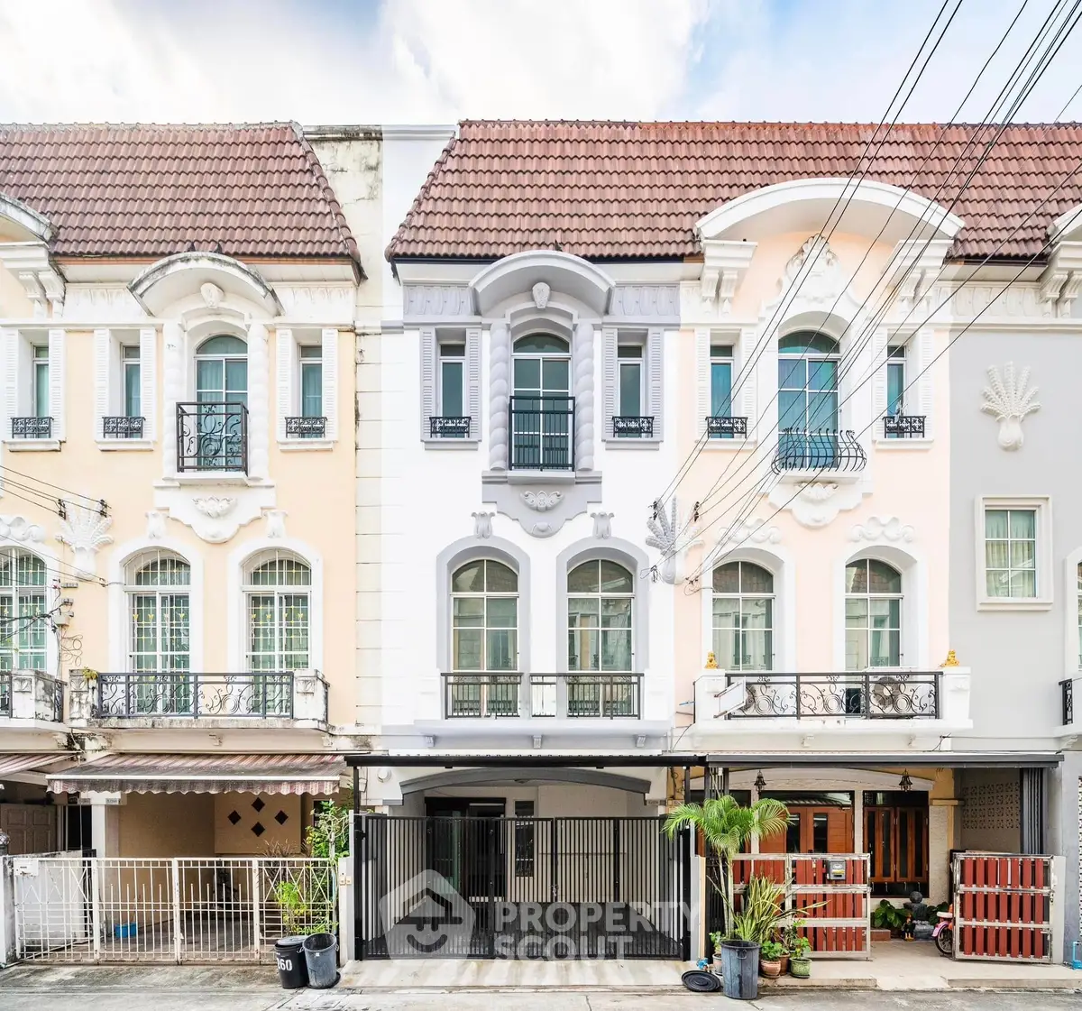 Charming European-style townhouse with elegant facade and spacious balconies