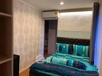 Cozy bedroom with modern decor and air conditioning unit