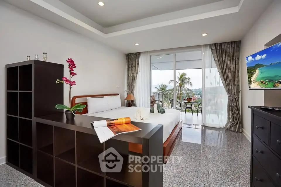 Luxurious bedroom with stunning balcony view in modern apartment