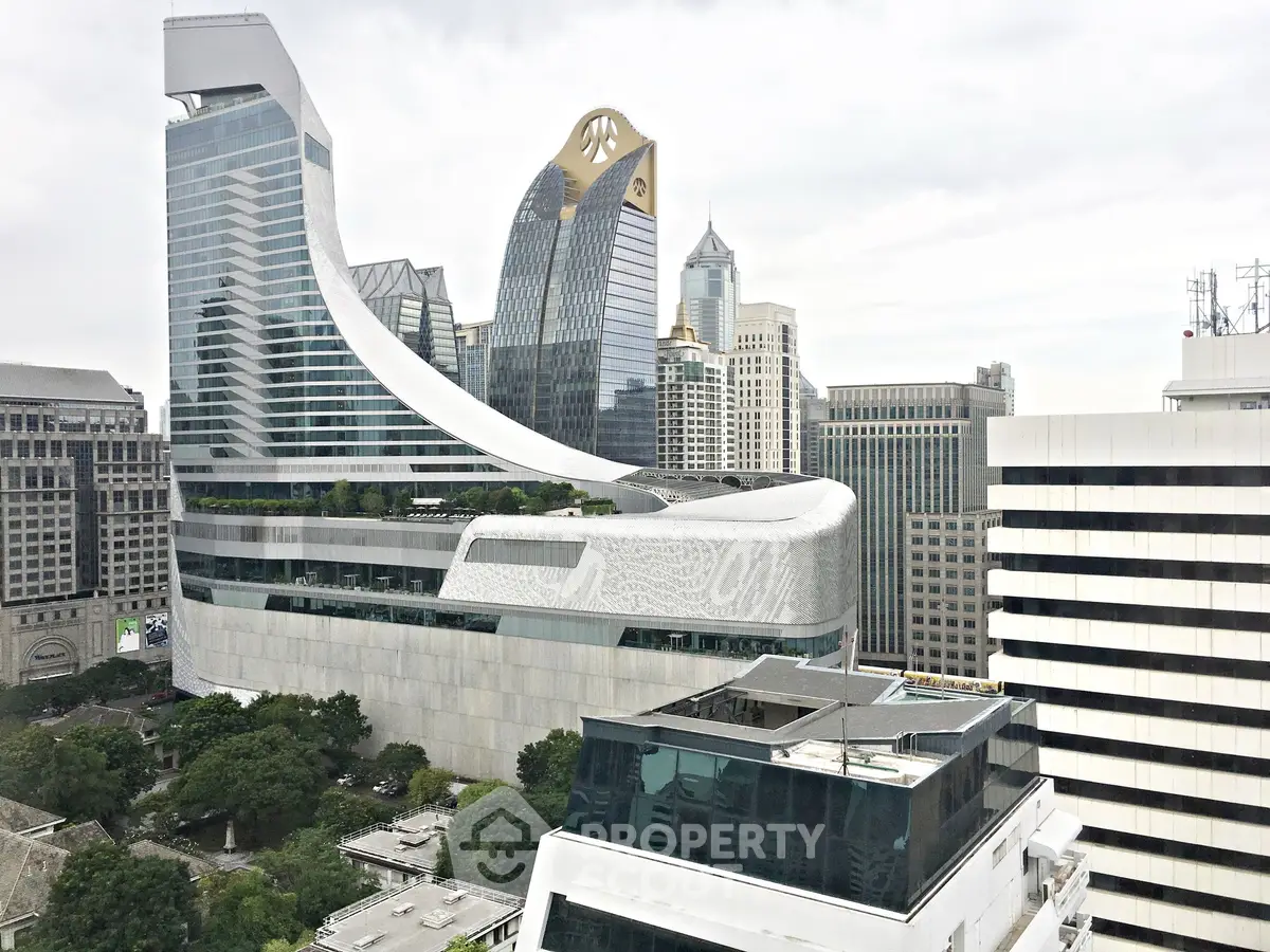 Stunning modern cityscape with iconic architectural buildings and lush greenery.