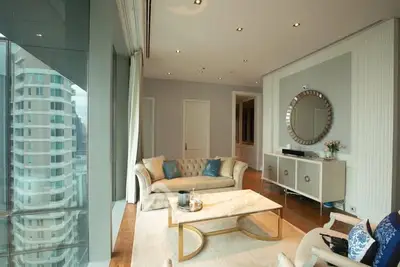 Luxurious living room with elegant decor and stunning city view