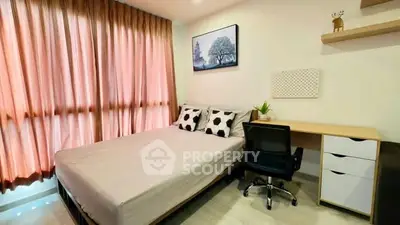 Cozy bedroom with modern decor and ample natural light