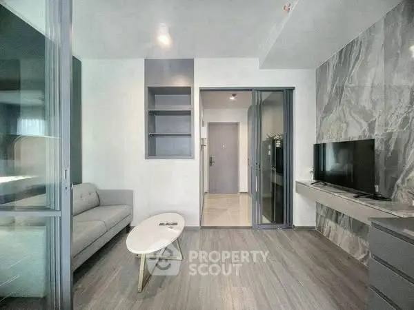 Modern living room with sleek design and marble accent wall