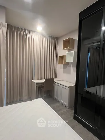 Modern bedroom with study area and stylish storage solutions