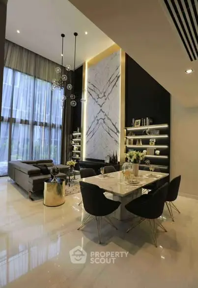 Luxurious modern living room with high ceilings and elegant decor