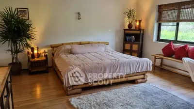 Cozy bedroom with bamboo bed and natural light