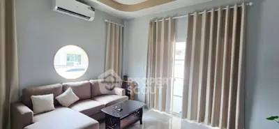 Modern living room with stylish furniture and natural light