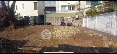 Vacant land plot in urban area ready for development, ideal for residential or commercial projects.