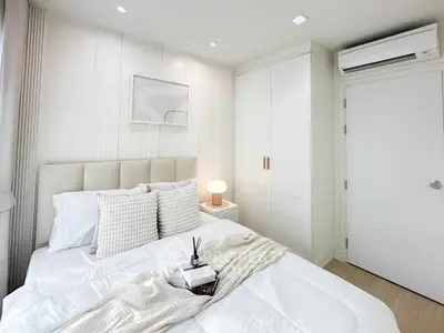 Elegant bedroom with modern decor and cozy ambiance