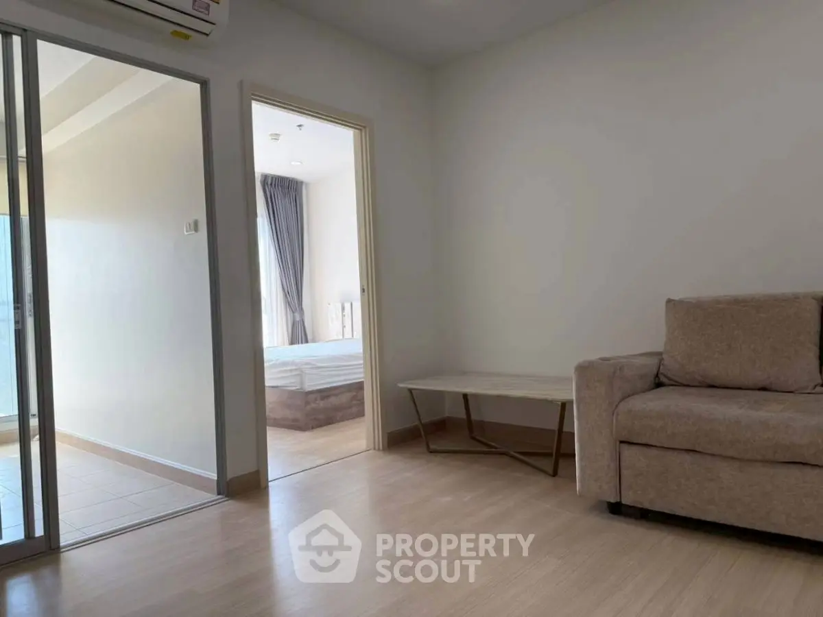 Modern apartment interior with cozy living room and bedroom view