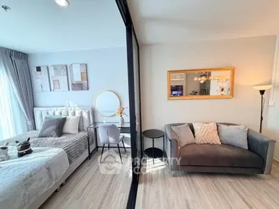 Modern studio apartment with stylish decor and cozy living area