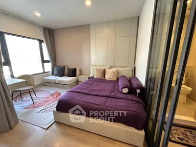 Modern bedroom with elegant decor and ensuite bathroom