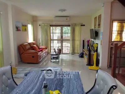 Spacious living room with modern furniture and natural light