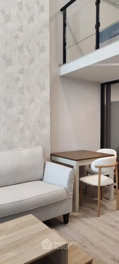 Modern living room with stylish furniture and mezzanine level