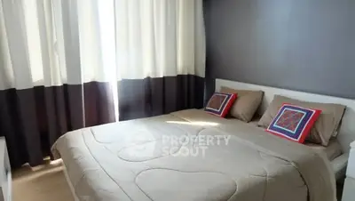 Cozy bedroom with modern decor and natural light