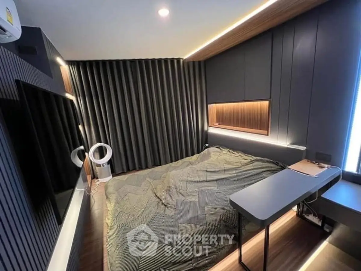 Modern bedroom with sleek design, ambient lighting, and stylish decor for a luxurious living experience.