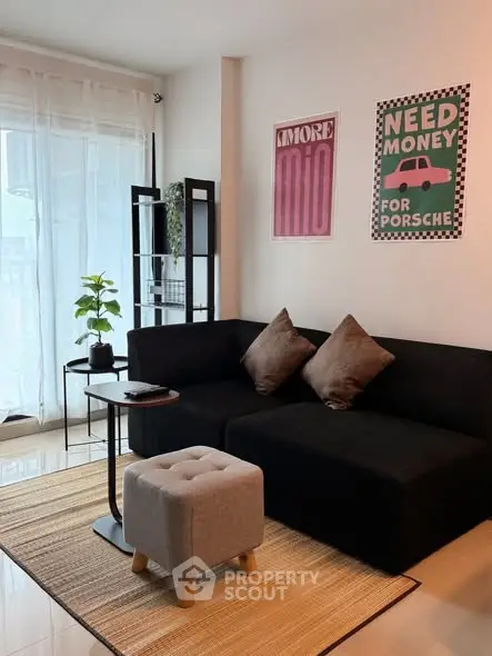 Stylish living room with modern decor and cozy seating area.