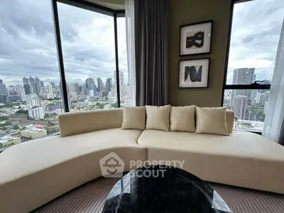 Luxurious living room with panoramic city view and elegant curved sofa