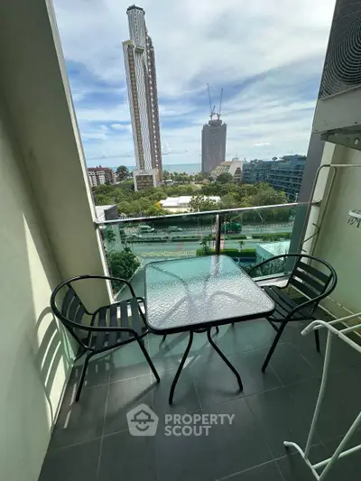 Charming balcony with city view, perfect for relaxation and enjoying the skyline.