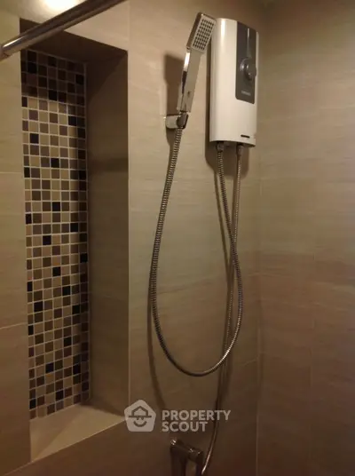 Modern bathroom shower with sleek design and built-in shelving