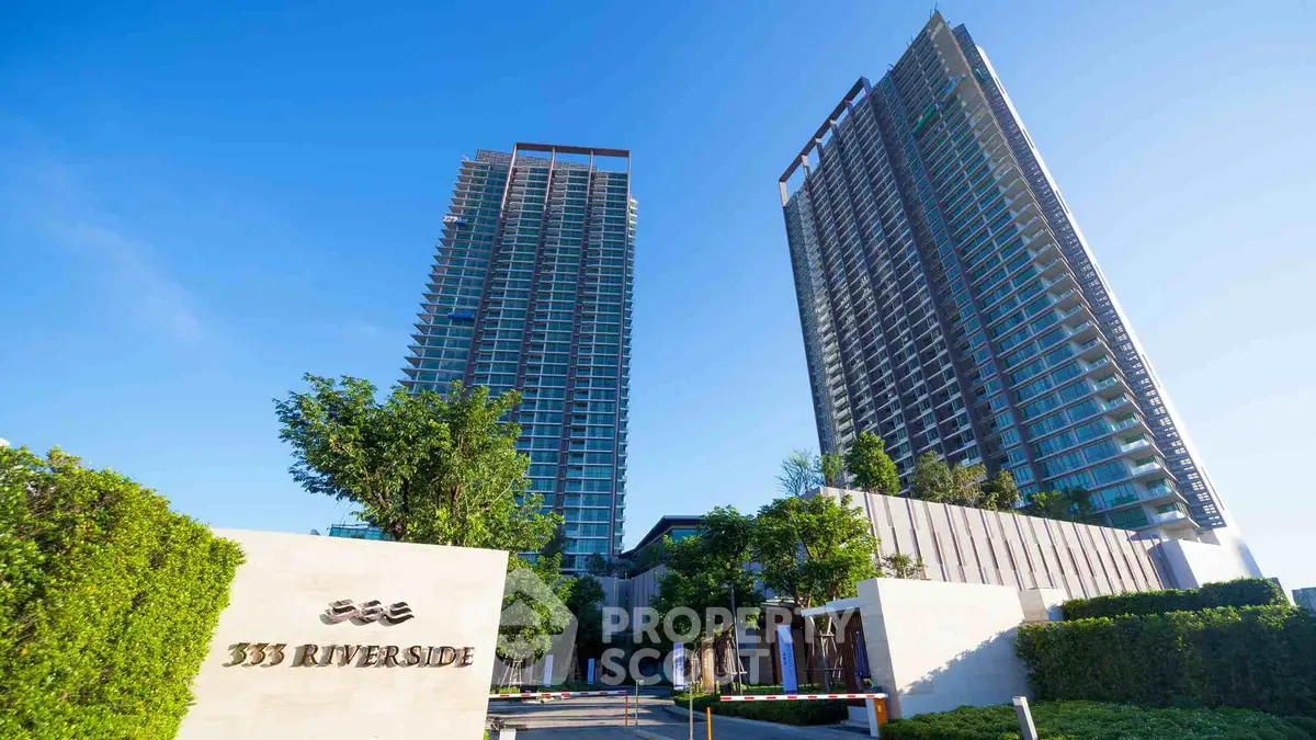 Stunning view of modern high-rise buildings at 333 Riverside with lush greenery.