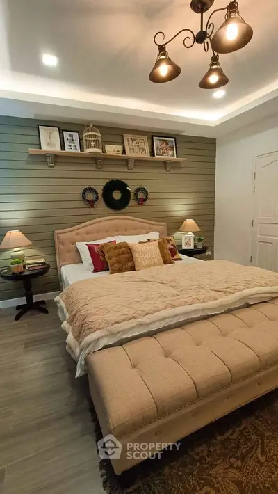 Cozy bedroom with elegant decor and plush bed in a stylish real estate property.