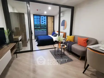 Modern studio apartment with stylish decor and open layout in urban setting.