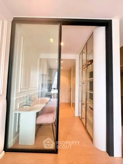 Modern dining area with glass sliding door and elegant decor