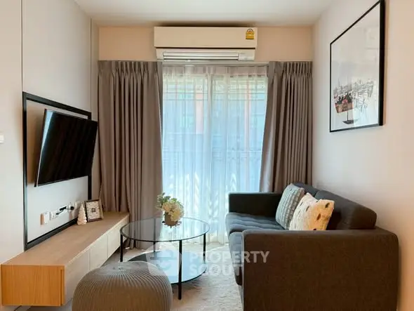 Modern living room with sleek furniture and natural light