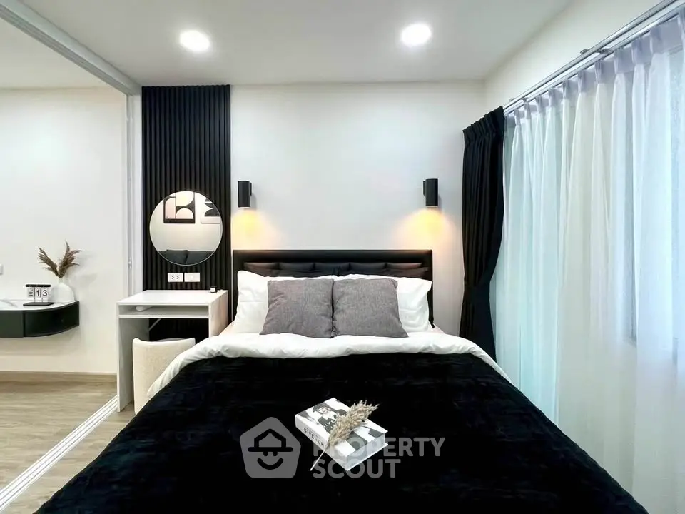 Modern bedroom with stylish decor and cozy ambiance