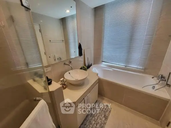 Modern bathroom with sleek design and bathtub