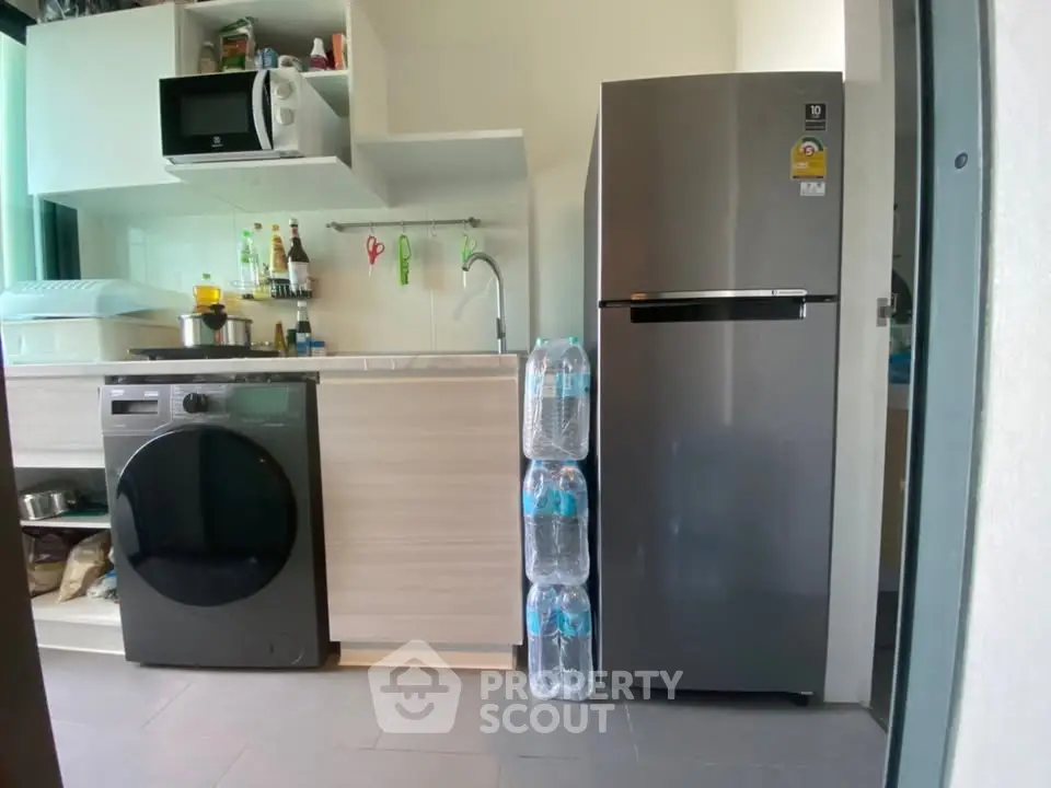Modern kitchen with sleek appliances and ample storage space
