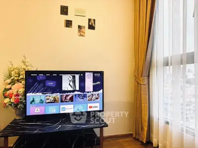 Stylish living room with modern TV setup and elegant decor
