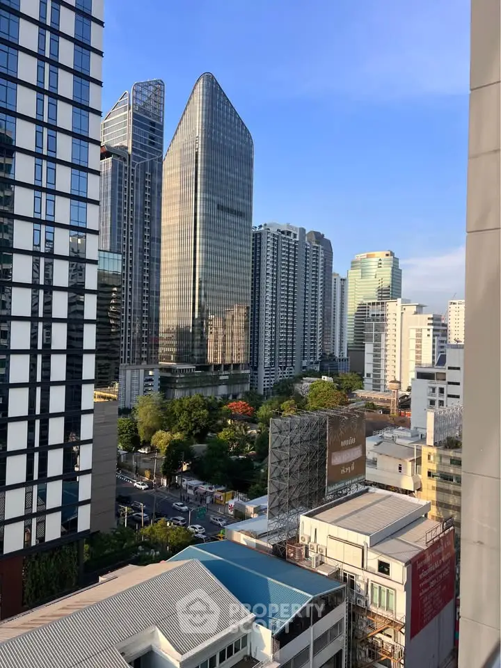 Stunning cityscape view of modern skyscrapers and urban skyline, perfect for luxury real estate investment.
