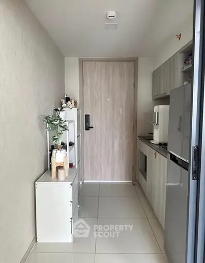 Compact modern kitchen with sleek cabinetry and minimalist design