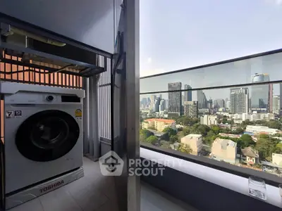 Stunning city view from a modern balcony with a washing machine, perfect for urban living.