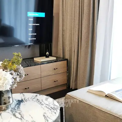 Stylish living room with modern TV setup and elegant decor