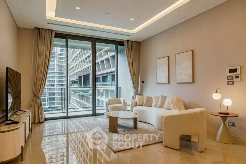 Luxurious modern living room with elegant decor and large windows offering stunning city views.