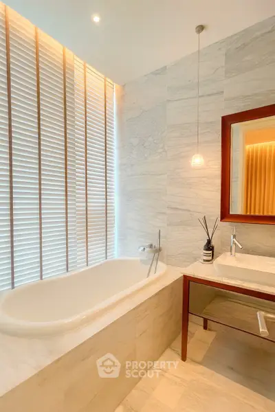 Luxurious bathroom with elegant marble finishes and modern fixtures