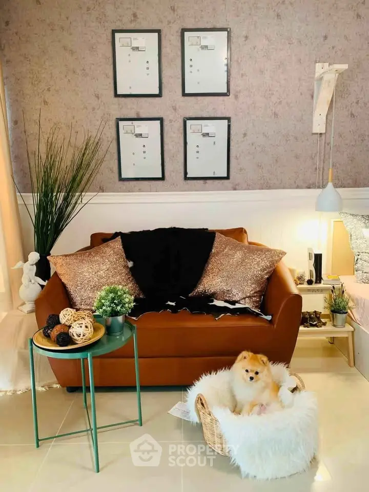 Charming living room with cozy sofa, stylish decor, and adorable pet in a basket, perfect for relaxation.