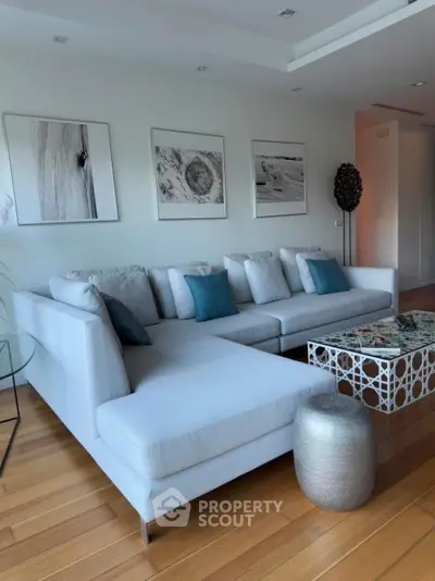 Modern living room with stylish sectional sofa and elegant decor