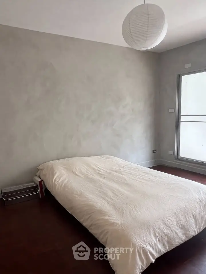 Minimalist bedroom with modern design and natural light