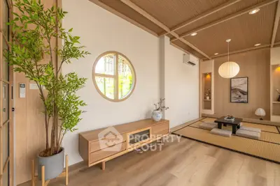 Elegant Japanese-style living room with tatami mats and wooden accents