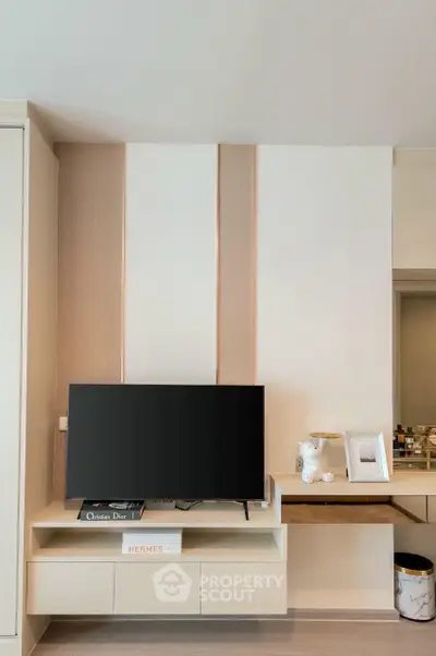 Modern living room with sleek TV unit and stylish decor