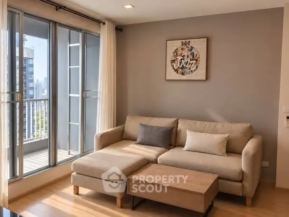 Modern living room with cozy sofa and balcony view in a stylish apartment.