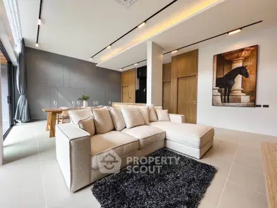 Luxurious modern living room with elegant beige sofa and stylish decor