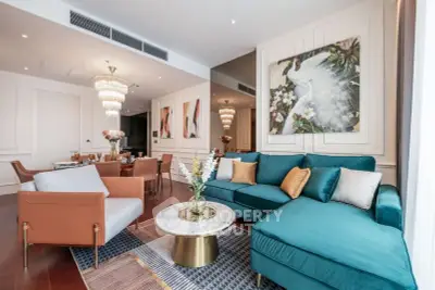 Luxurious living room with elegant decor and plush seating in modern apartment.