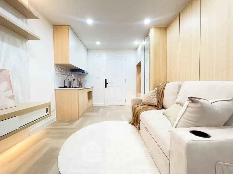 Modern living room with cozy sofa and stylish wooden accents