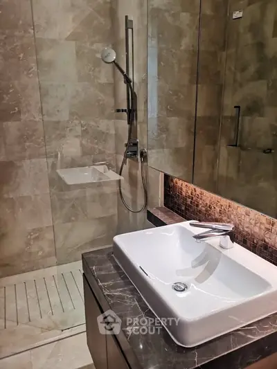 Luxurious modern bathroom with elegant marble finishes and sleek fixtures