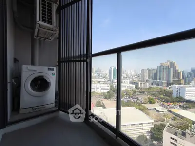 High-rise balcony with washing machine and stunning city view